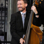 Tom Farmer playing bass Tom Farmer playing bass