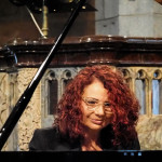 Joanna MacGregor CBE Joanna MacGregor playing piano