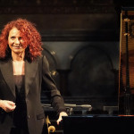 Joanna MacGregor CBE Joanna MacGregor stood at piano